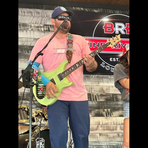 Guitar/Vocals < Band Name >